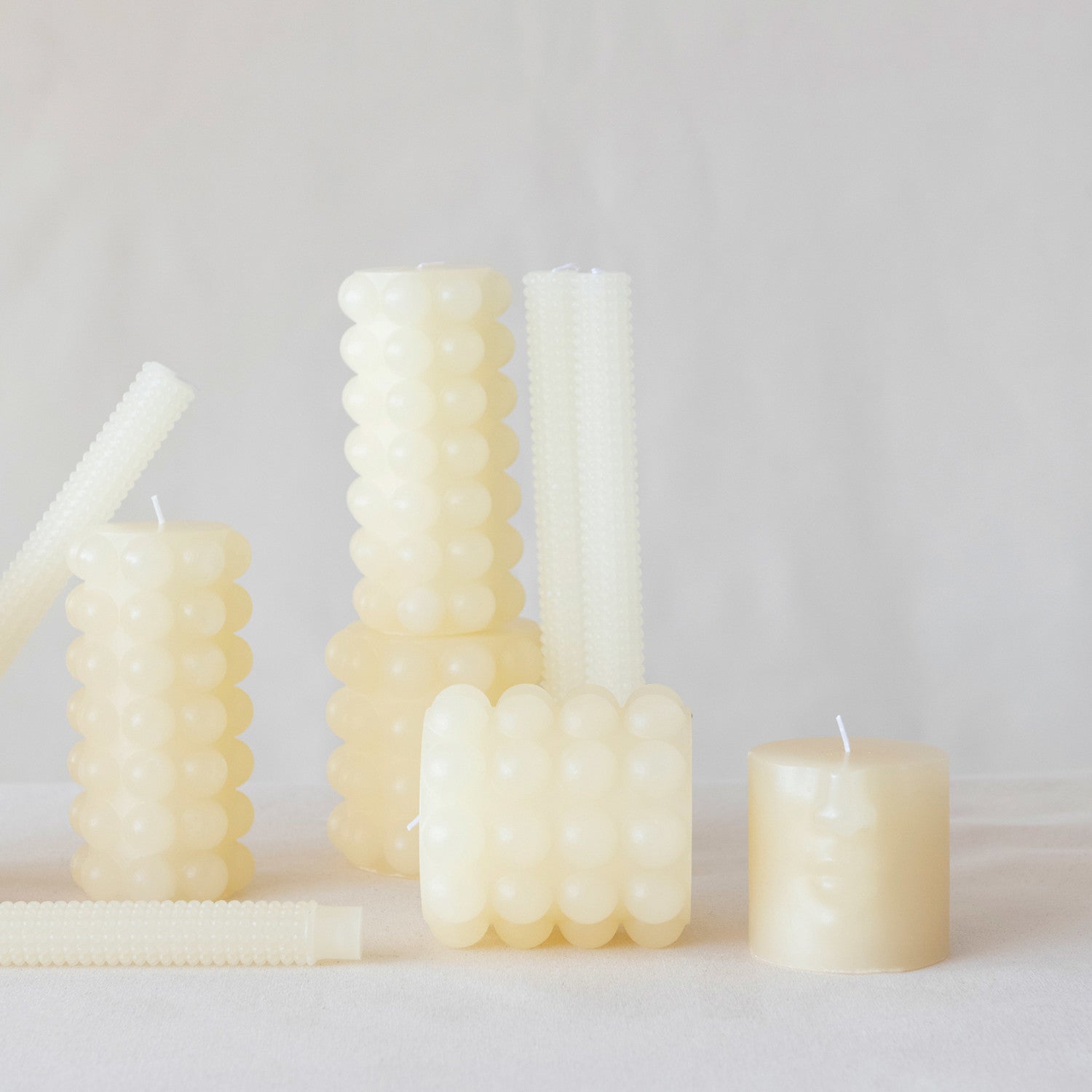 Unscented Hobnail Taper Candle in Cream